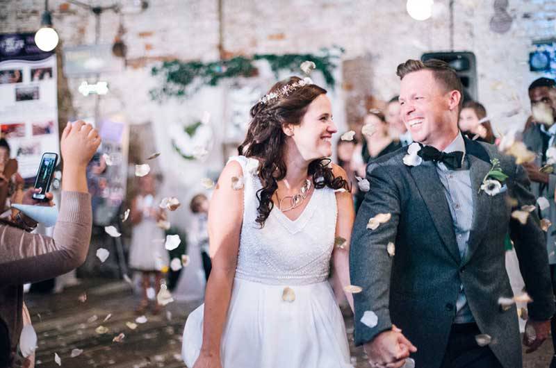 The Big Fake Wedding bride groom exit flower petals