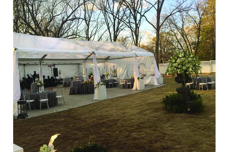 The Stratton House tent covered lawn area