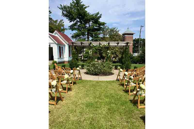 Woodruff-Fontaine house feature house outdoor ceremony wood folding chair seating