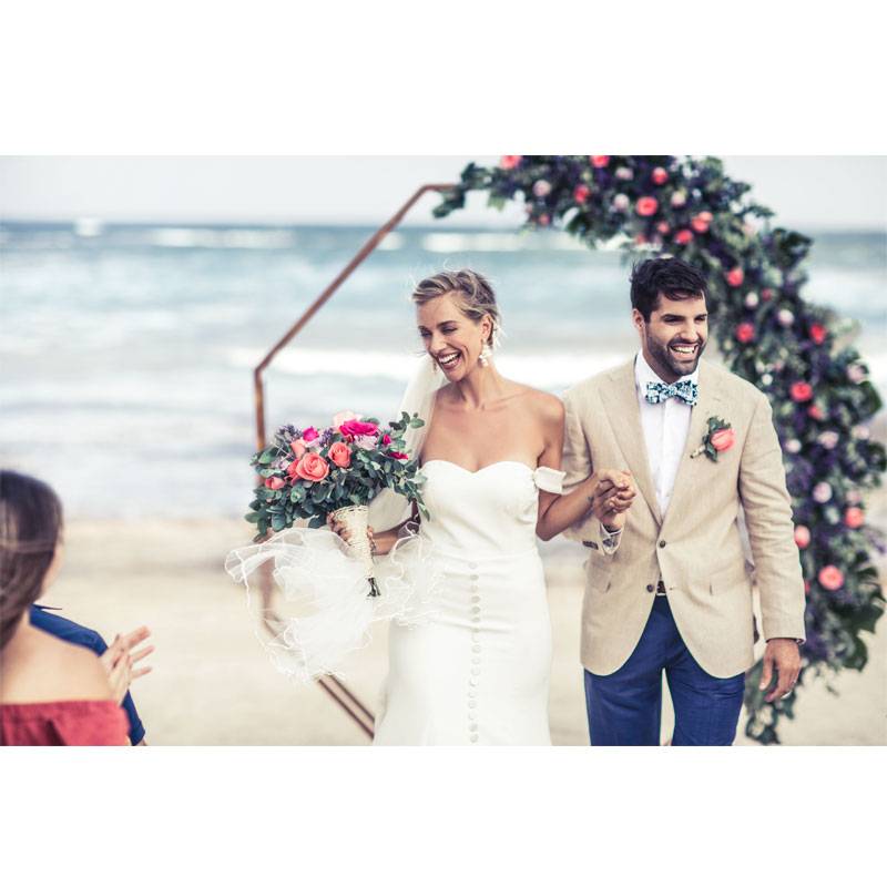 Unico Couple Walking Down Aisle