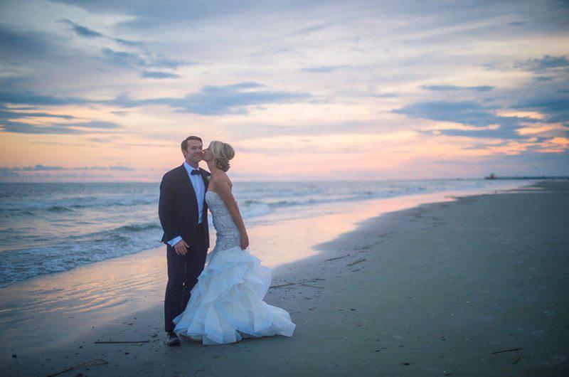  Molly Joseph Photography beach sunset bride and groom kiss