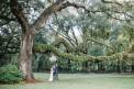 Wingate Plantation vows bride and groom by oak tree
