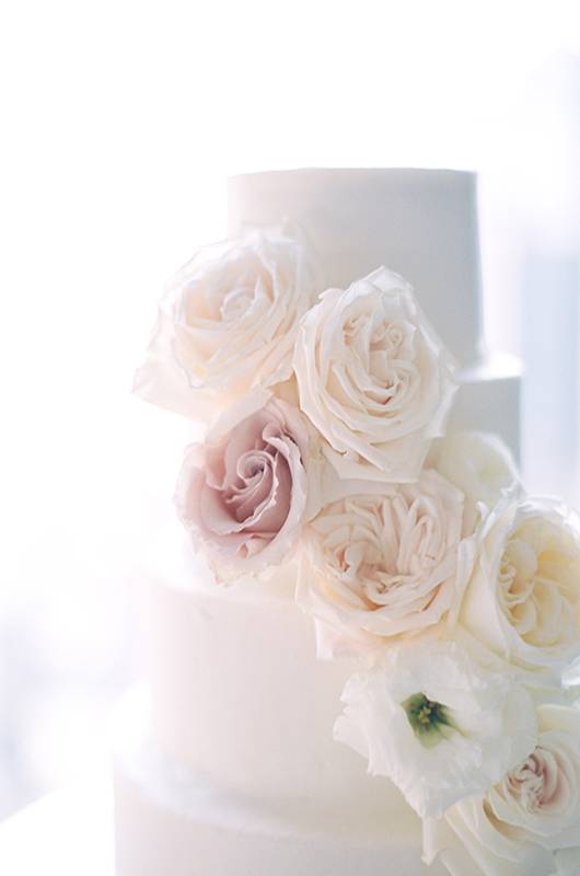 Christina Herubin And Afnajjer Hernandez Wedding Cake With Floral Accents