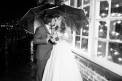 Historic Rice Mill black and white in the rain bride and groom