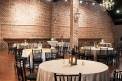 The Quonset Inside  tables Interior Round Tables Seating Lantern Candle Centerpieces