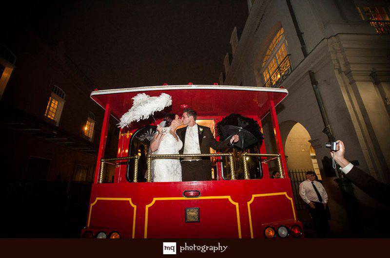 Omni Royal red streetcar wedding couple kissing