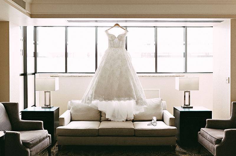  Margo Gronauer & Steven Saharovici Dress Hanging Above Couch