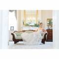 The Davis Home at Strawberry Plains bride on sofa