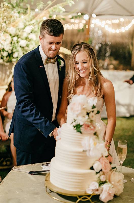Brittany Knox And Tom Mueller Cutting Cake