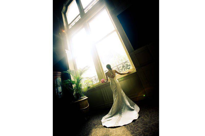 Kelly Sherlock LLC bride looking out window