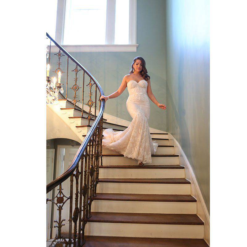 byant_&_chiuppi-bride_decending_stairs