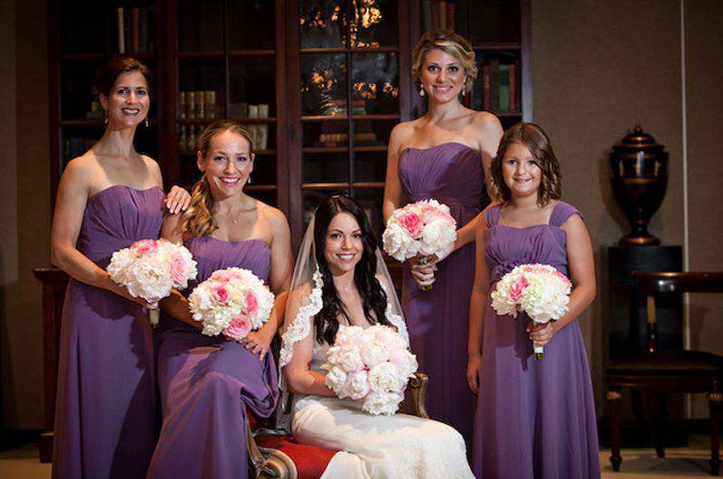 Andy Beach and Co bridal story Picture Bridesmaids Bride sitting