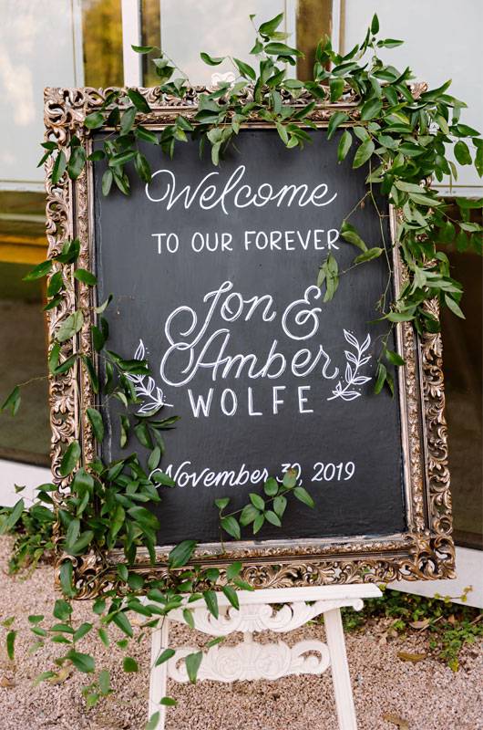 Amber Calderon And Jon Wolfes Real Wedding In Austin Texas Greenery Adorned Signage