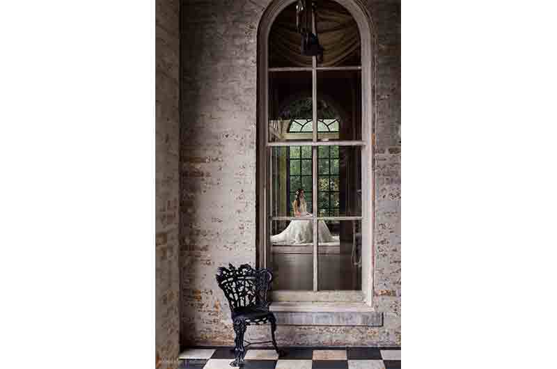 Annesdale Wedding and Events Mansion window venue bride sitting